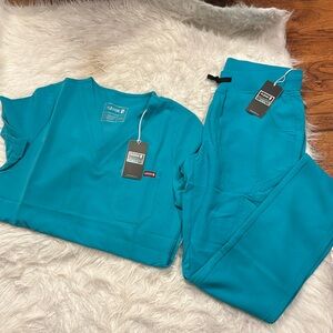 Pledge5 Teal Uniform Women's size XS NWT.